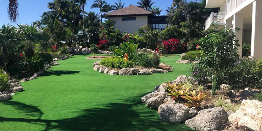 Can You Install Artificial Turf Next to Real Grass?